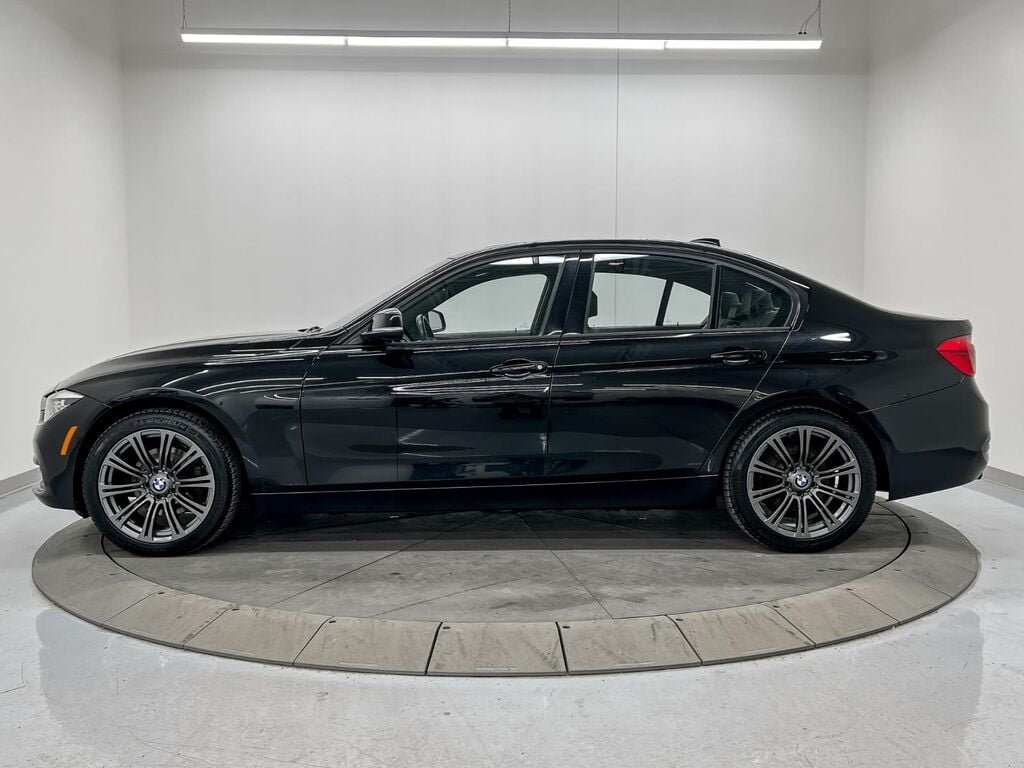 BMW 3 Series 330i xdrive 4-door sedan black