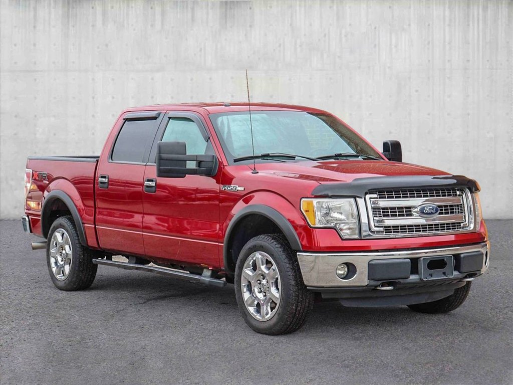 Ford F-150 SuperCrew 4-door truck red