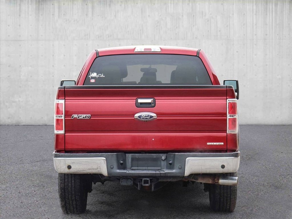 Ford F-150 SuperCrew 4-door truck red